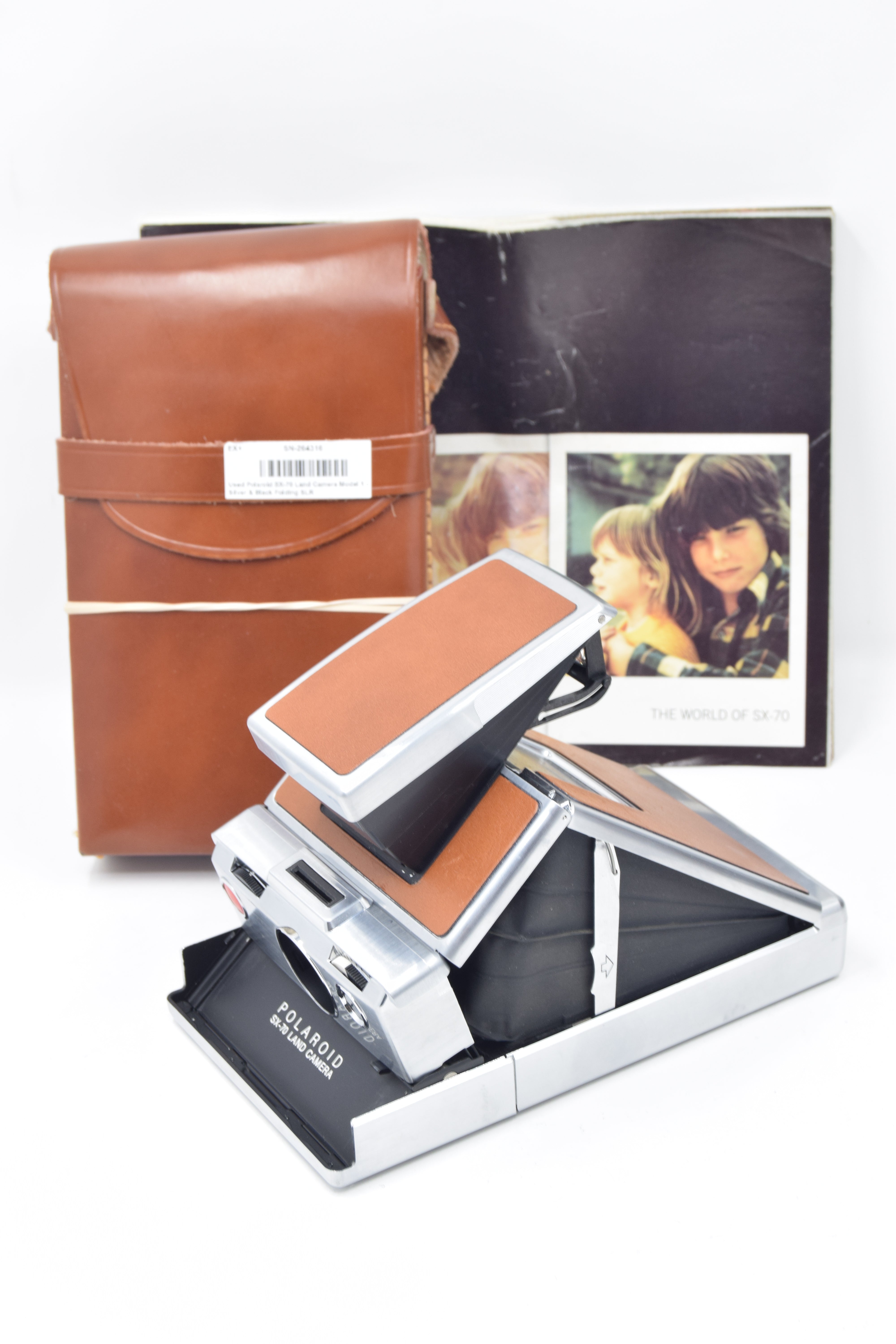 Used Polaroid SX-70 Land Camera Model 1 - Silver & Black Folding SLR