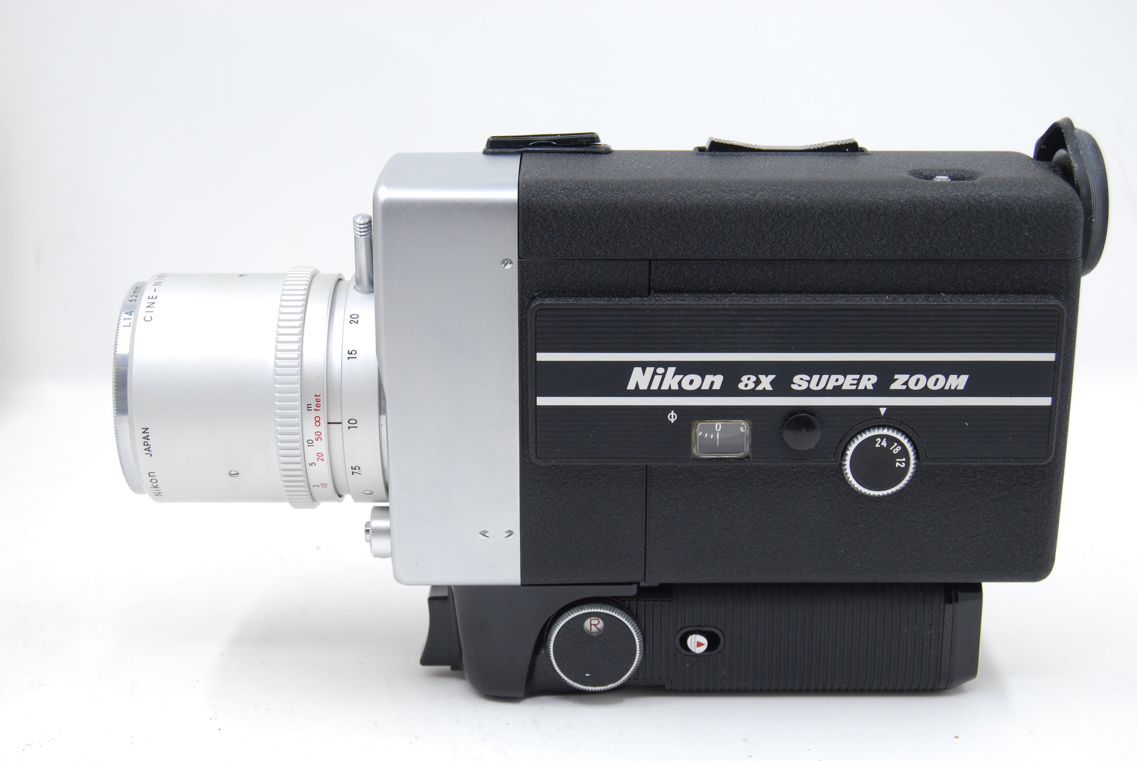 Used Nikon 8x Super Zoom 8mm Movie Camera (slight Haze in lens) w/L1A Filter