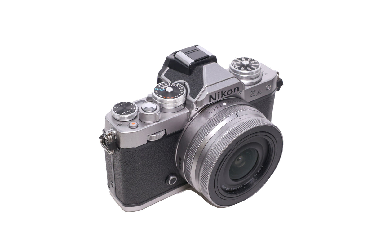 Used Nikon Z fc DX-format Mirrorless Camera w/ NIKKOR Z DX 16-50mm f3.5-6.3 VR (Silver)