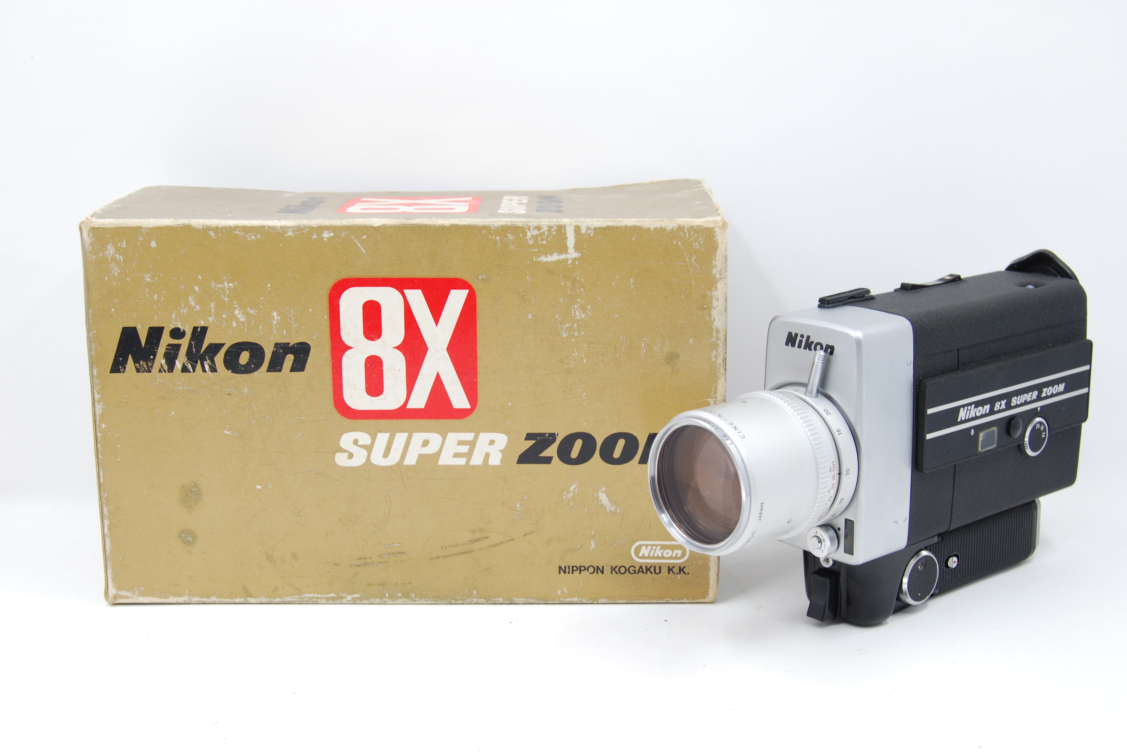 Used Nikon 8x Super Zoom 8mm Movie Camera (slight Haze in lens) w/L1A Filter