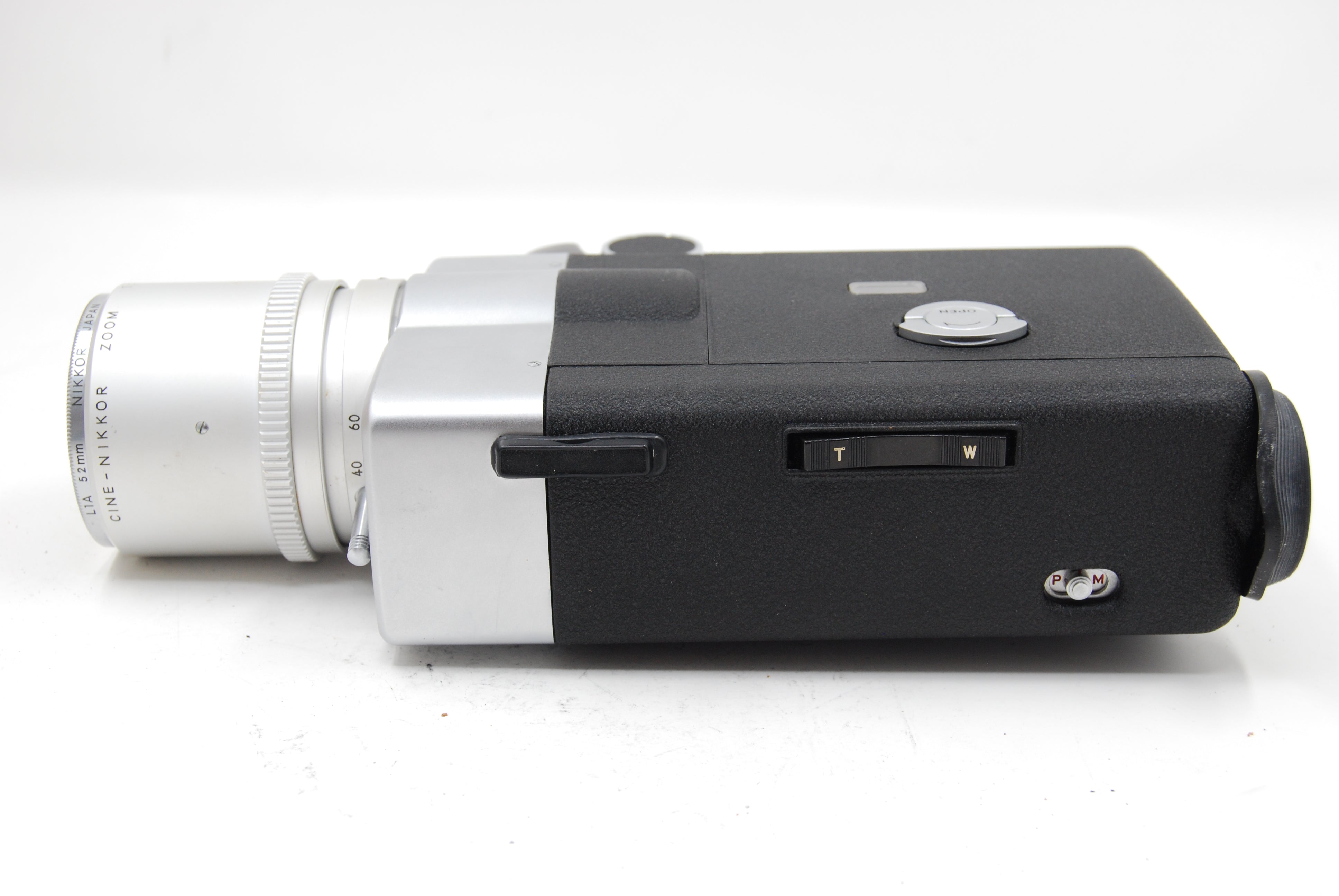 Used Nikon 8x Super Zoom 8mm Movie Camera (slight Haze in lens) w/L1A Filter