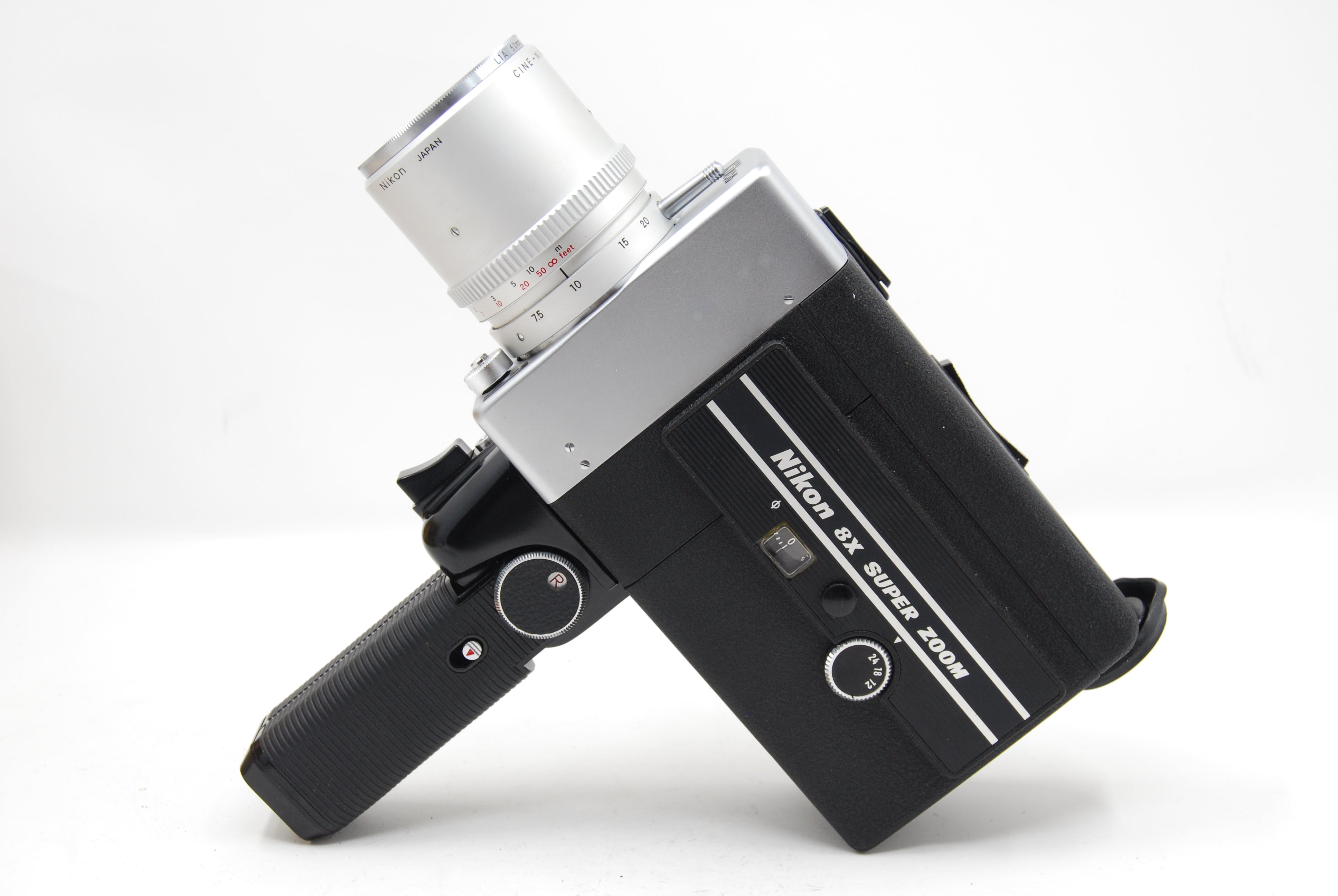 Used Nikon 8x Super Zoom 8mm Movie Camera (slight Haze in lens) w/L1A Filter