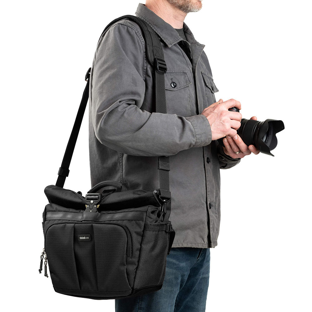 FocusPoint Crossbody 13L worn over the shoulder