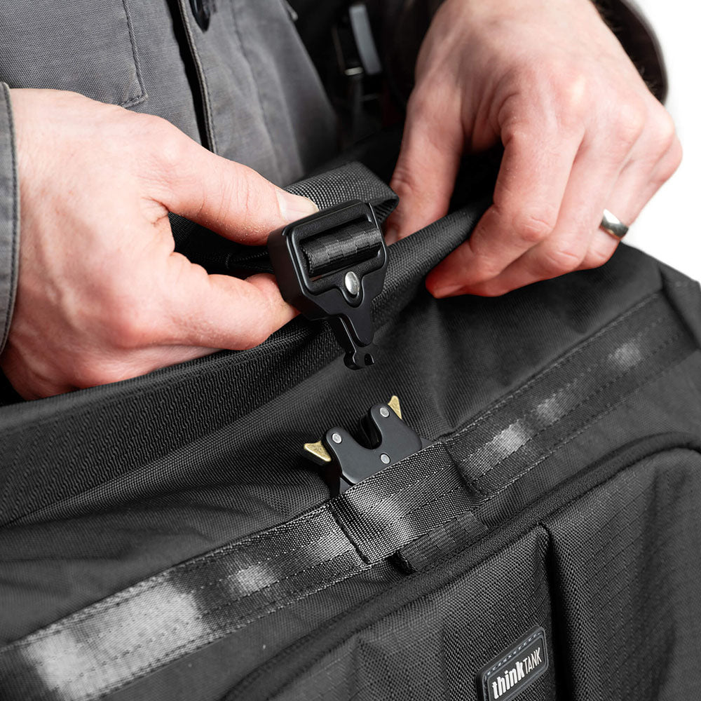 Asphalt Black FocusPoint Crossbody buckle and magnetic closure detail