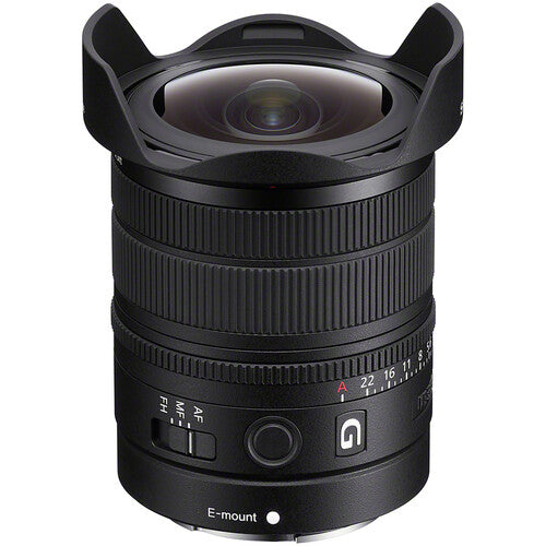 Sony SEL814G lens standing upright in a front three-quarter view with its hood attached.