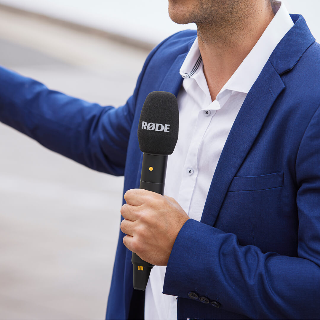 Interview PRO in a TV reporter setup, close-up